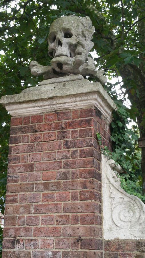 Skull & crossed bones on the gate of St. Nicholas Church, Deptford, London