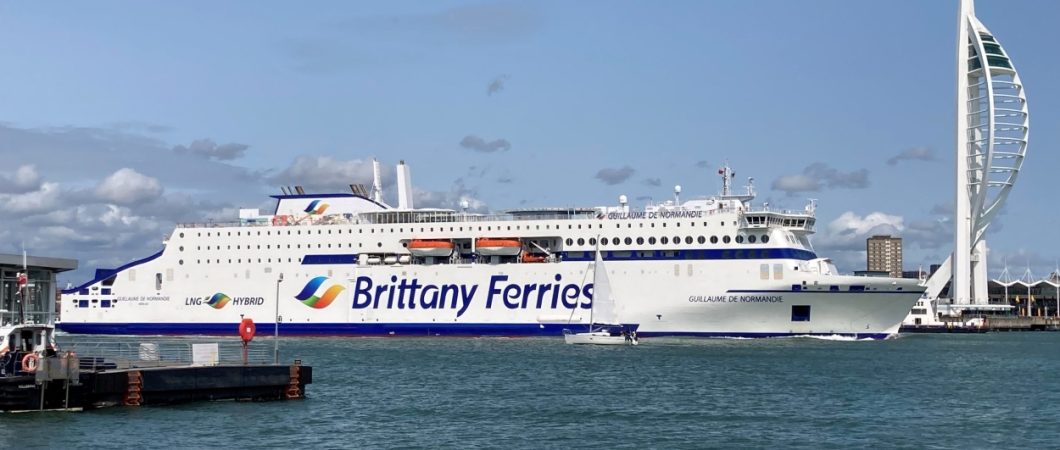 White hulled Brittany Ferries ferry - Guillaume de Normandie - leaving Portsmouth with the Spinnaker tower behind