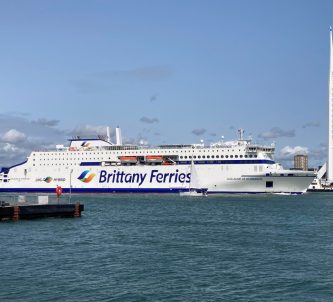 White hulled Brittany Ferries ferry - Guillaume de Normandie - leaving Portsmouth with the Spinnaker tower behind