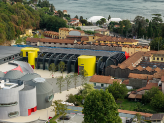 Aerial view of the Moto Guzzi factory & museum site at Mandello del Lario on Lake Como, Italy