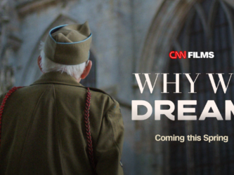 Movie poster featuring the back of a grey-haired veteran in army uniform walking towards a church