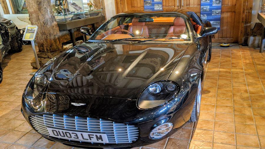 Black luxury sports car with tan leather seats, the Aston Martin DB7 Zagato
