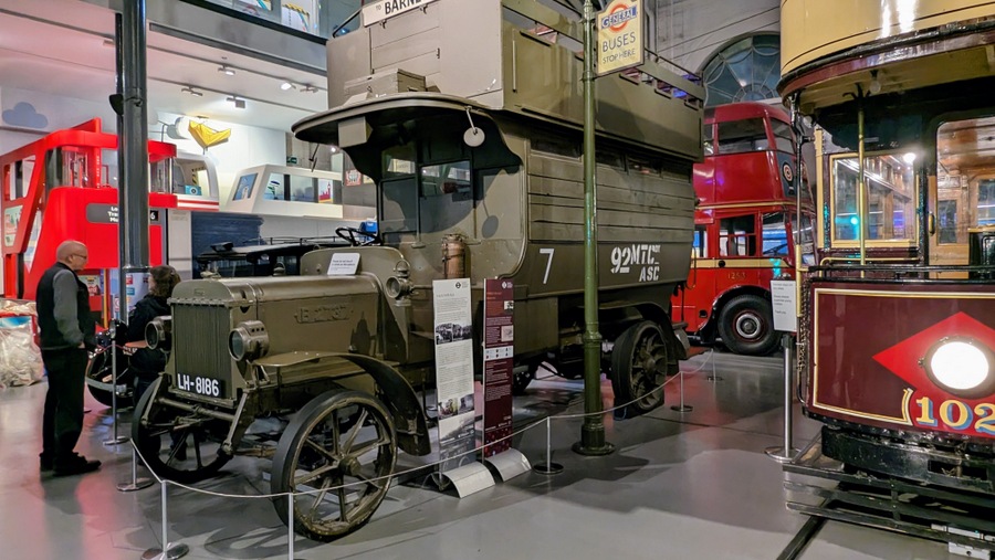 vintage double-decker motorbus painted in army green