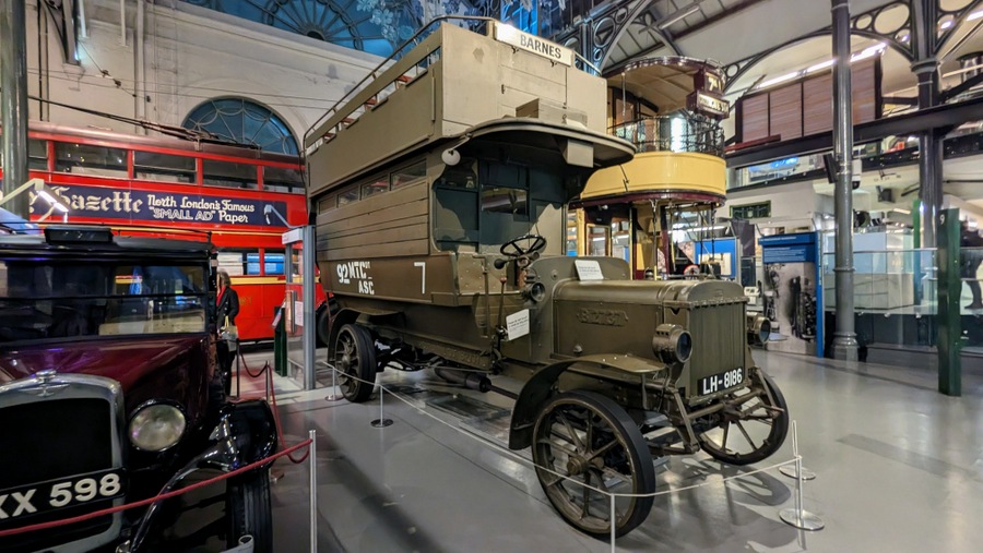 vintage double-decker motorbus painted in army green