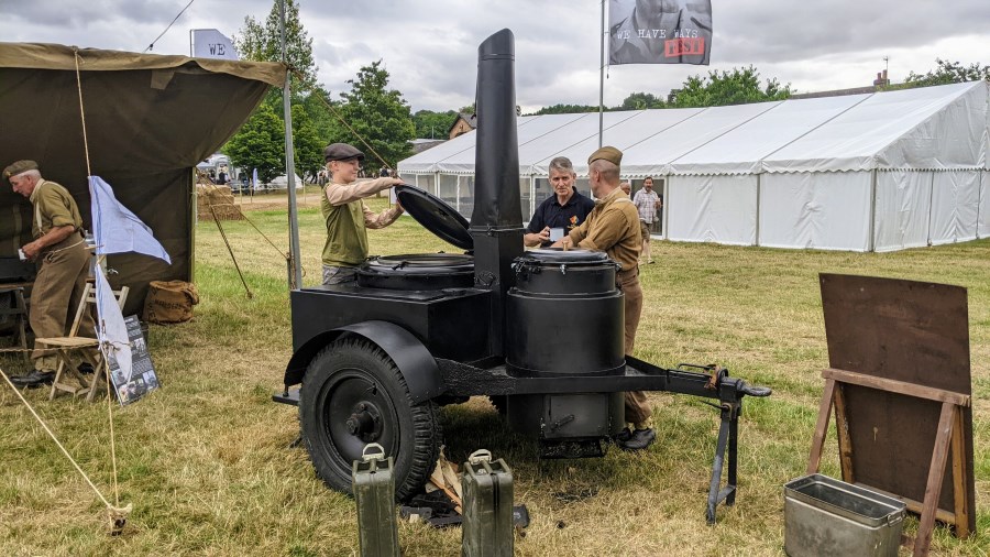 An operational vintage field kitchen at a festival