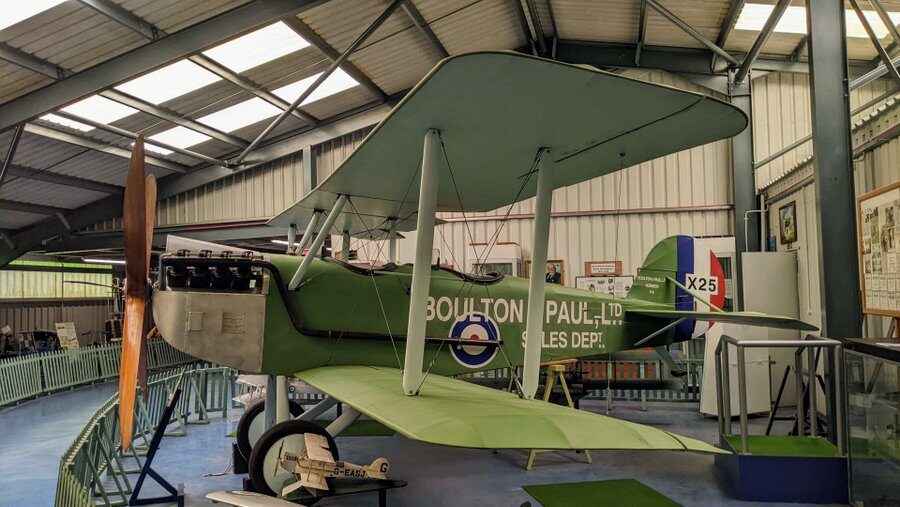 Light grey slender biplane with 'Boulton & Paul Sales Dept' written on the fuselage