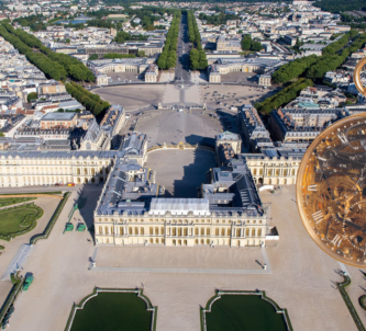 Aerial view of the palace of Versailles with Breguet's No. 160 watch inset over it