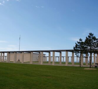Side view of the memorial and its pergola