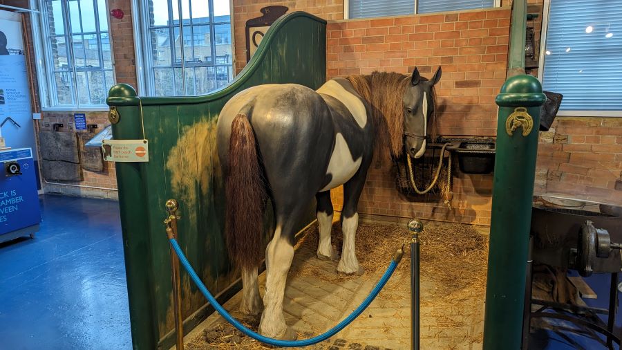 Replica horse in a stable