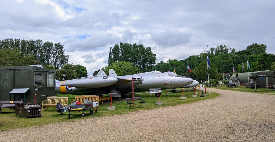View of the museum grounds with a silver twin-engined Canberra bomber in the foreground