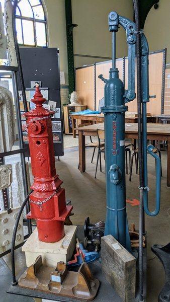 Tall cast-iron village pumps