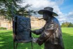 Close up of Winston Churchill painting statue