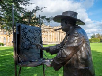 Close up of Winston Churchill painting statue