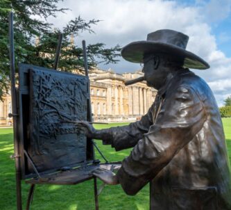 Close up of Winston Churchill painting statue