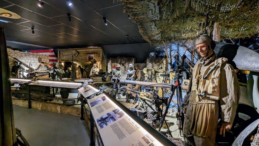 Crowded diorama with German soldiers (mannequins) and equipment