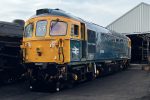 An old diesel locomotive in shiny British Rail colours (blue & yellow)