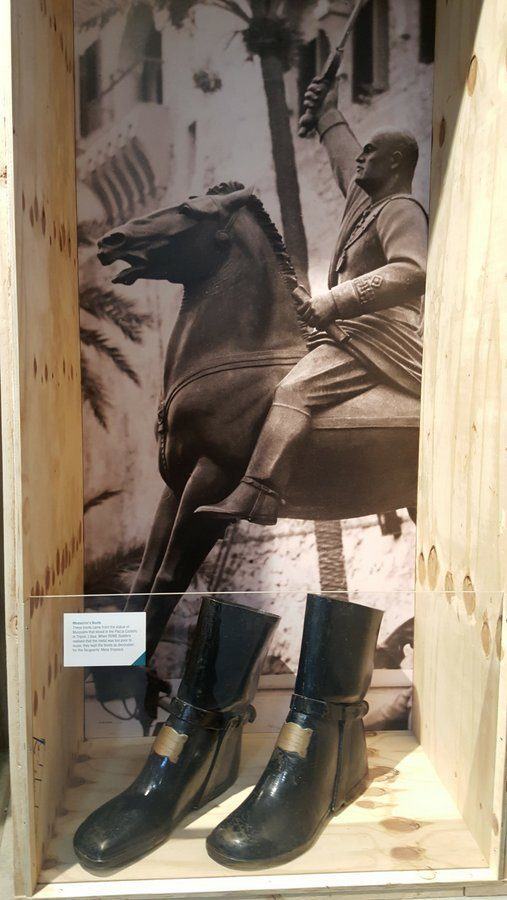 Mussolini's boots and a photo of the statue they came from