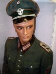 A German officer's uniform on a mannequin with make-up and long eyelashes