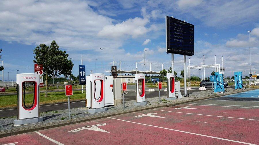 A row of E-charging stations looking like petrol pumps