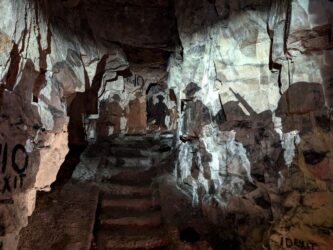 The silhouettes of British soldiers projected on the Wellington Quarry tunnel walls