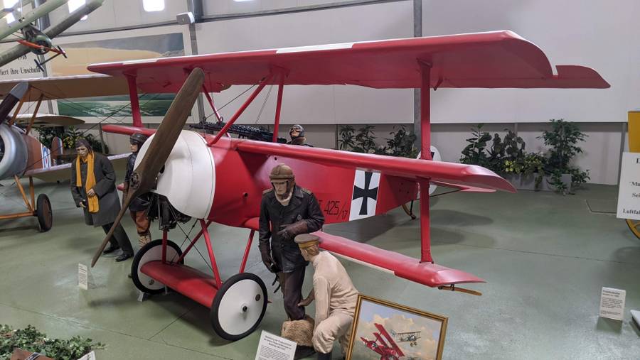 A red triplane with German markings