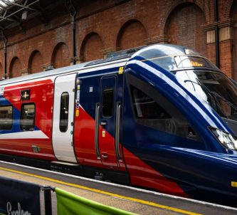 A Chiltern Railways trainset in its new Great British Railways blue & red livery