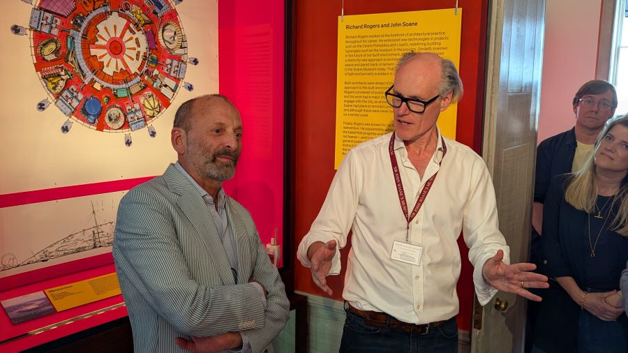 Ab Rogers & Will Gompertz standing in front of an audience