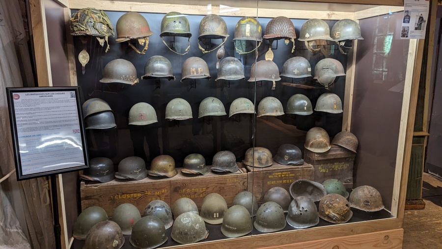 Display cabinet with around 30 helmets