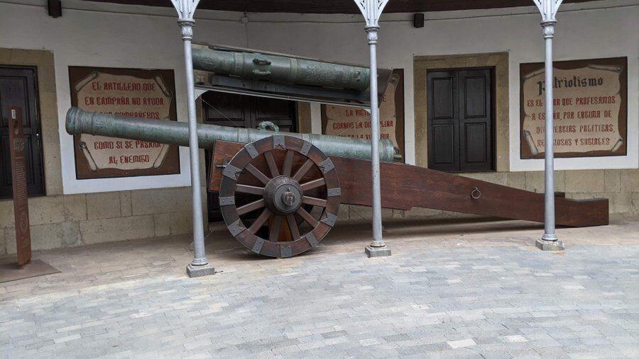 A magnificent large cannon with a wooden carriage