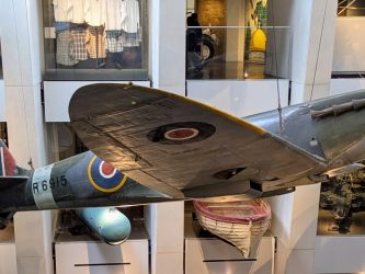 Spitfire suspended on wires in the Atrium of the IWM London