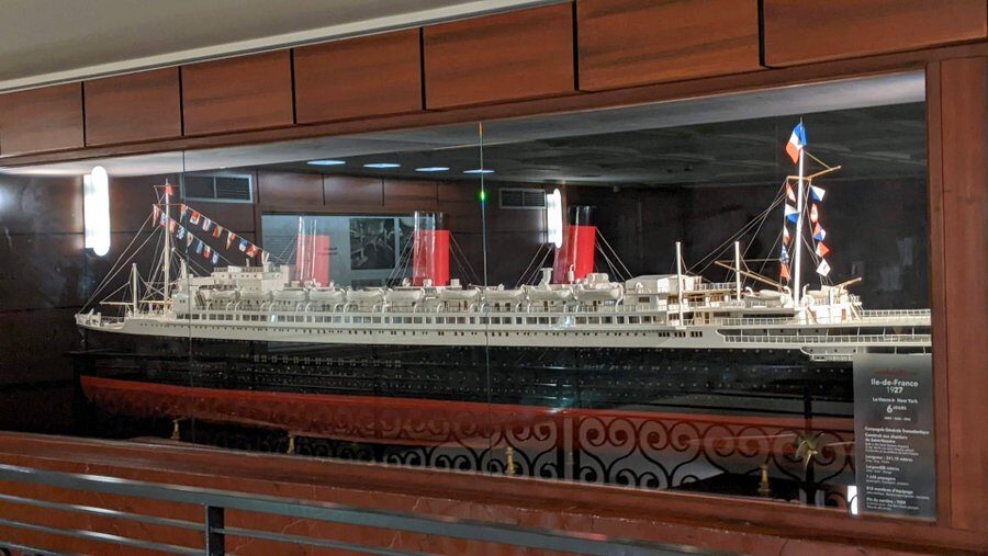 Large ship model in a glass display case