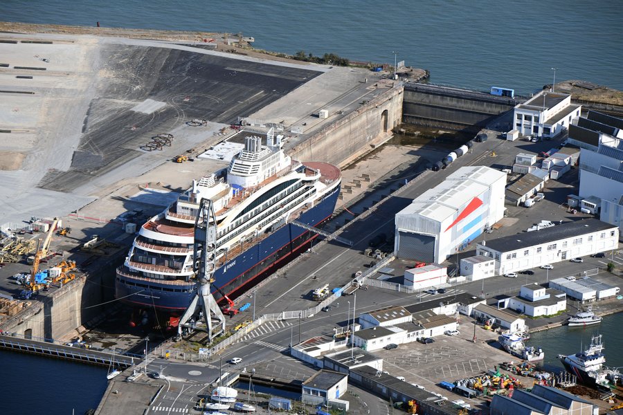 Aerial photo of a small cruise ship in the drydock