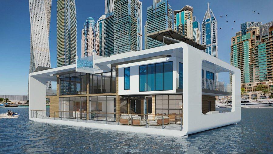 An independent Kempinski villa (houseboat) with the skyscrapers of Dubai behind
