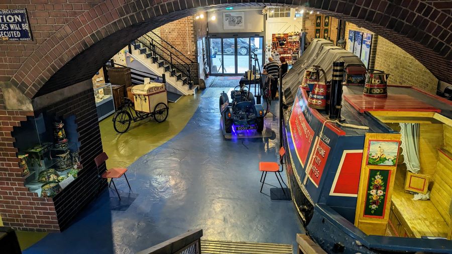 Ground floor of the LCM looking towards the street. The canal boat cabin is in the foreground