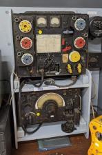 Old radio set with red, blue and yellow knobs