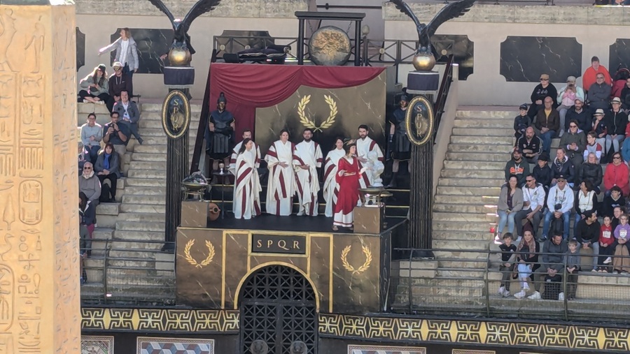 A group of toga wearing Roman officials in the stand