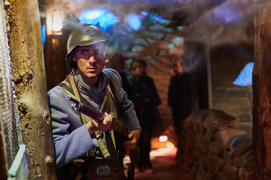 A French soldier with his rifle in the tunnel