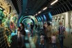 Design render of visitors in one of the new tunnel galleries