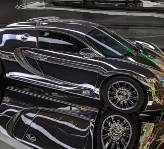 Mirrored Bugatti Veyron with a mirrored background