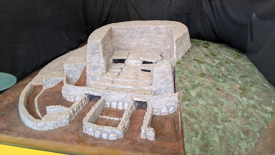 a cutaway model of the burial chambers of the Dissignac Tumulus