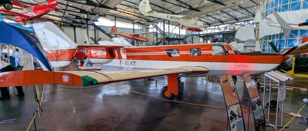 Moynet push-pull business aircraft displayed in orange & while livery