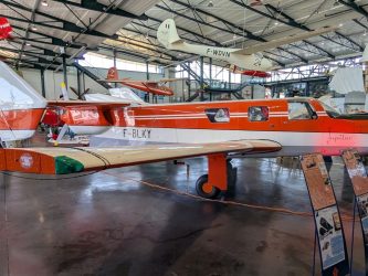 Moynet push-pull business aircraft displayed in orange & while livery