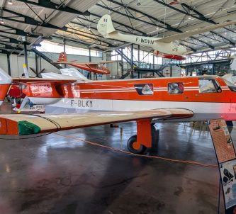 Moynet push-pull business aircraft displayed in orange & while livery