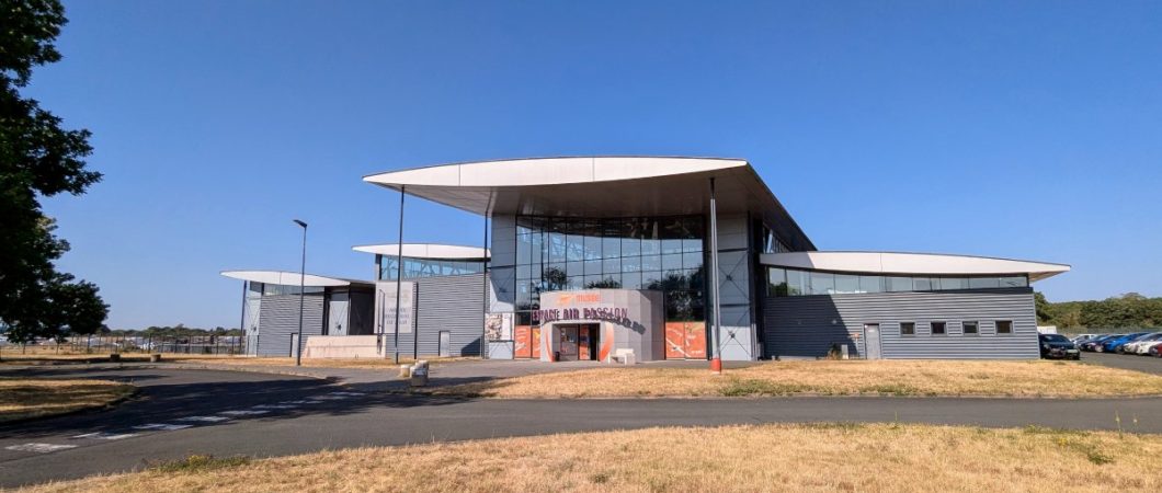 Exterior shot of the modern layered museum building