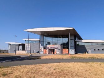 Exterior shot of the modern layered museum building
