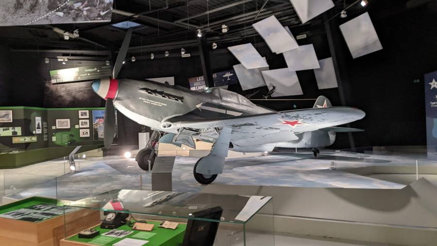 A Russian Yak-3 aircraft sits in the middle of the Normandie-Niemen gallery