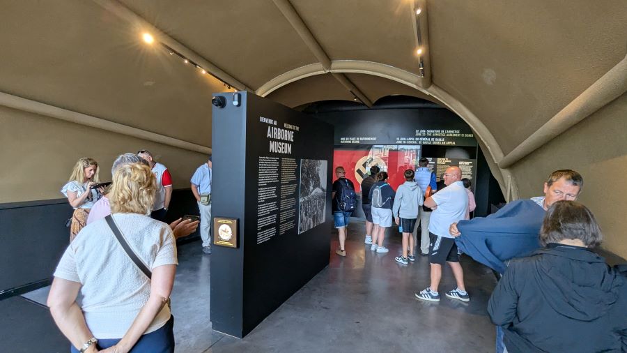 Visitors standing around in the entrance hall