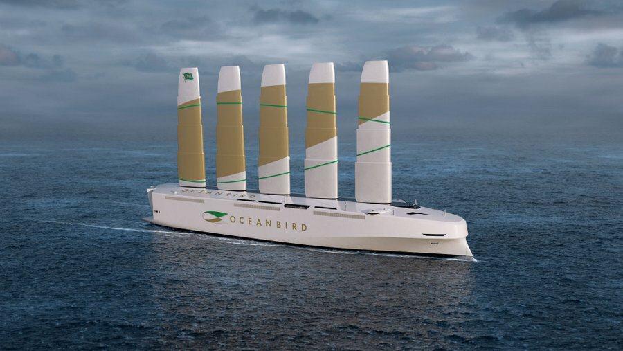 Design render of Oceanbird at sea with a white hull and white sails with gold bands 