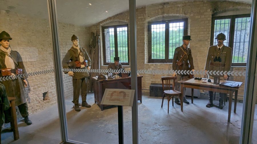 Mannequins of French officers in an office