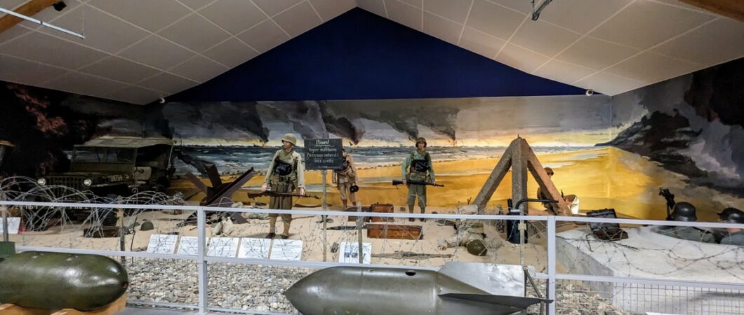 Omaha Beach diorama with US soldiers and German defenders